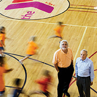 page spread photograph of Jeffry Cadorette and Bill Strine at Rocky Run YMCA